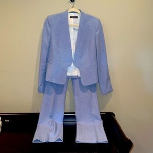 Nine West jacket and pants suit worn once and dry cleaned basically new.